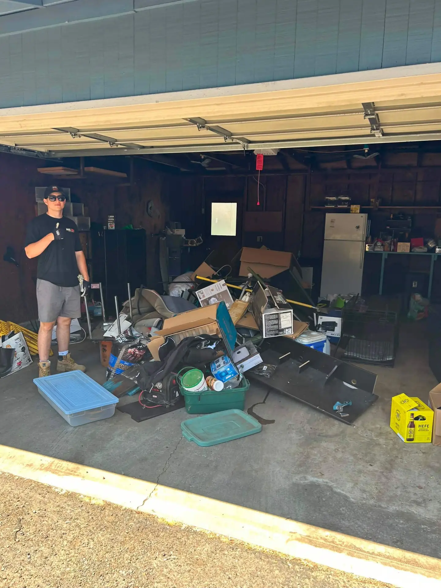 Haul Away crew member starting a garage cleanout job